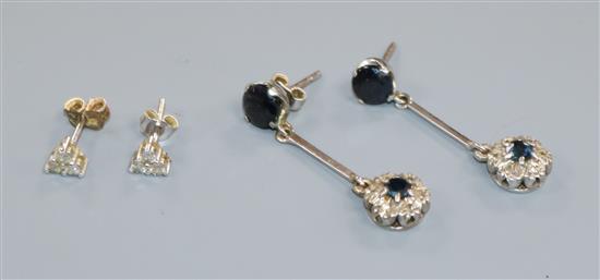 Two pairs of 9ct gold and gem set ear studs including diamond set.